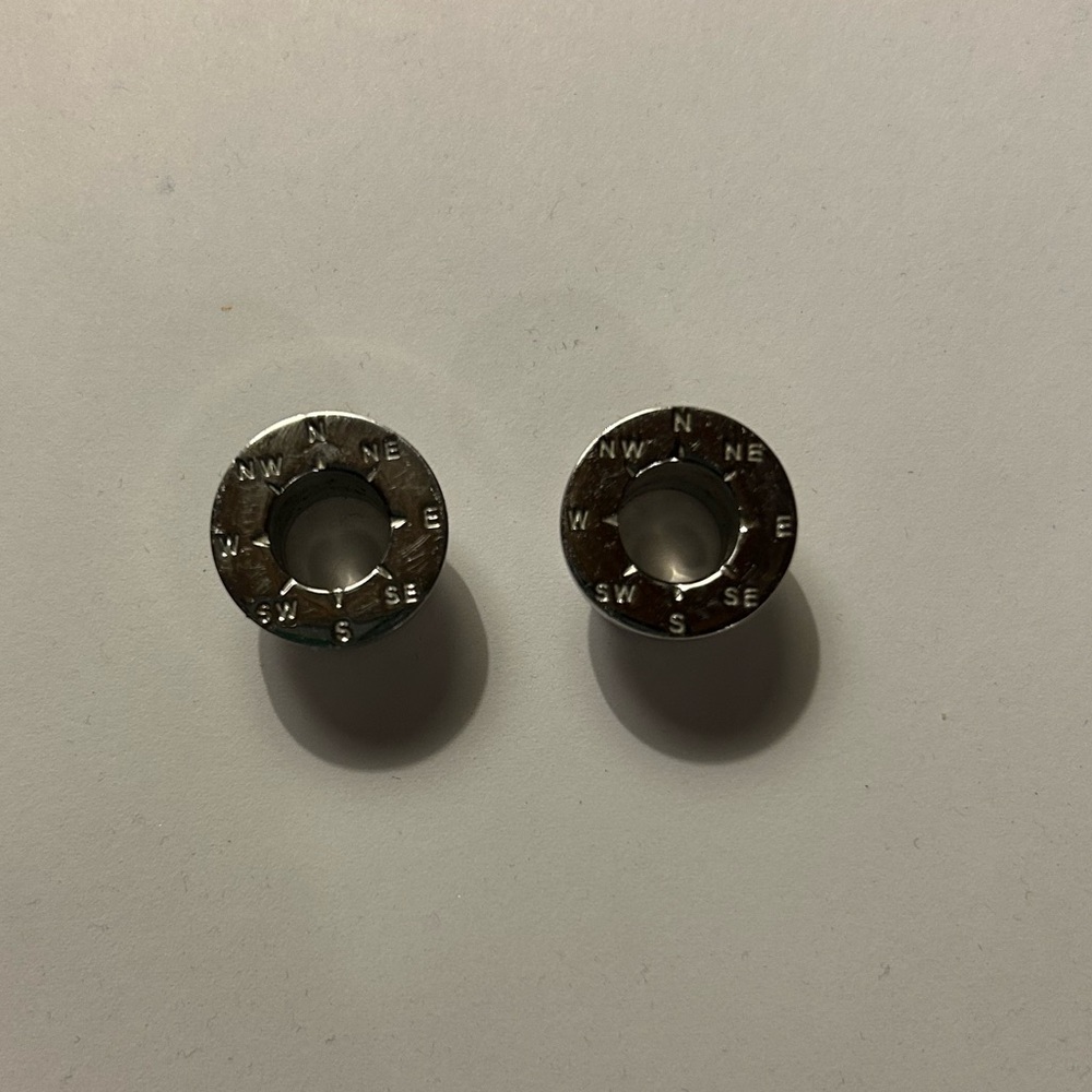 Compass plugs with screw on back. Gauge 00